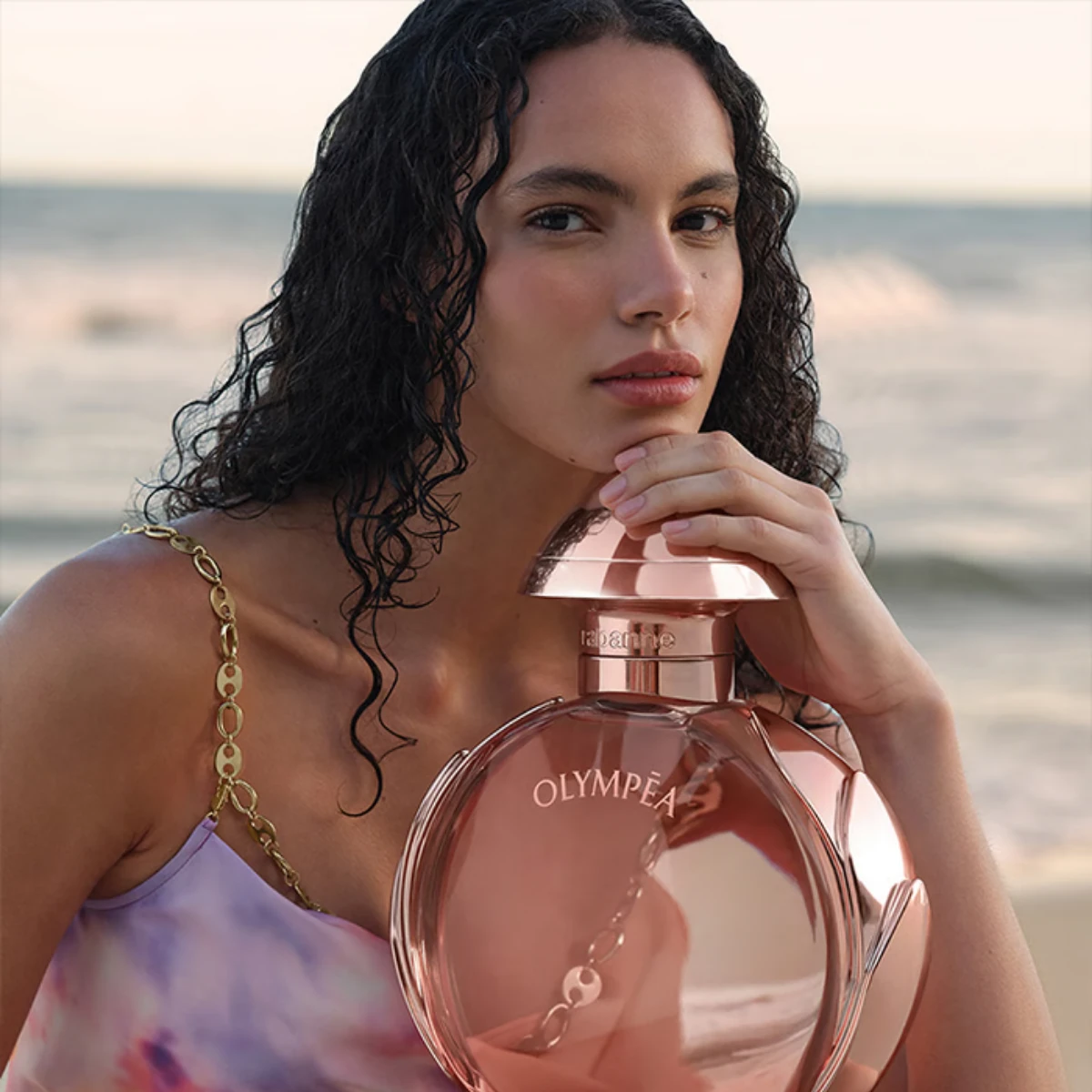 A woman holding Olympea