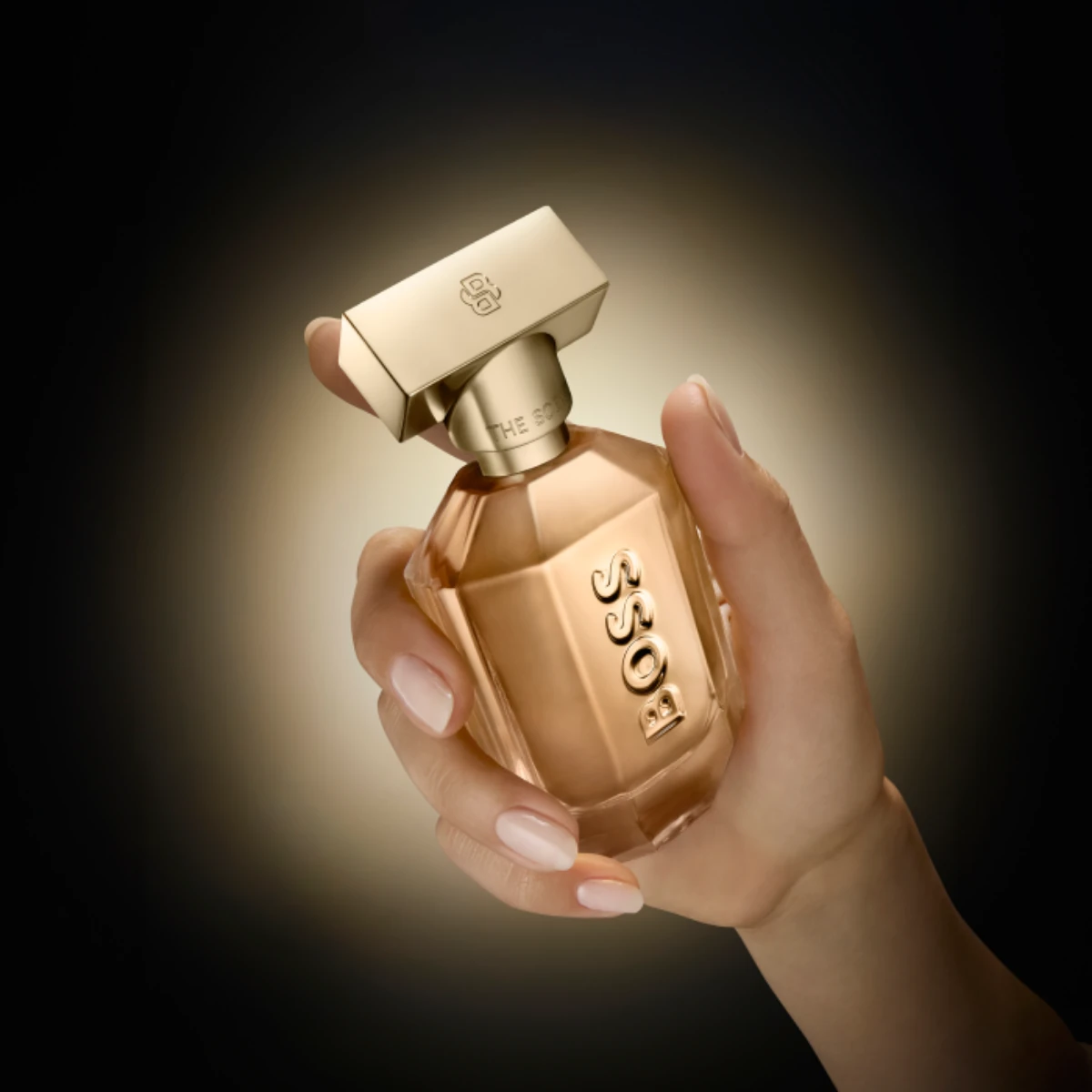 A hand holding Boss The Scent for Her
