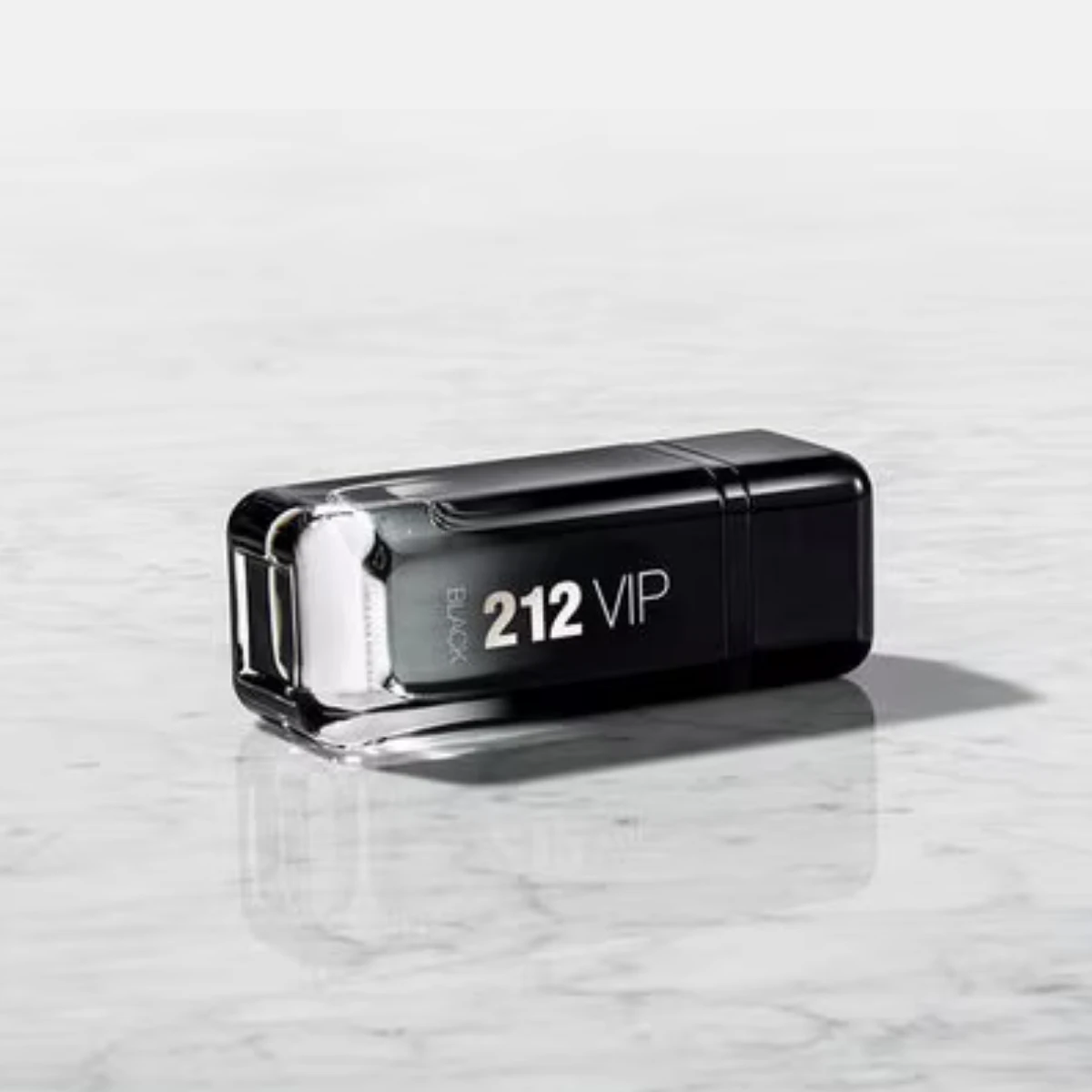 212 VIP Black resting on marble